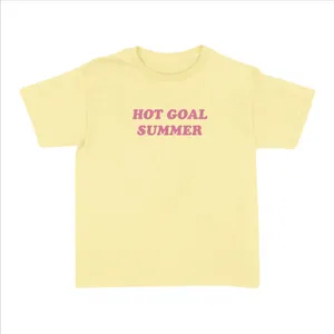 Ladies “Hot Goal Summer” Baby Tee | Women’s Funny Football Supporter Tee | Yellow Slogan Top with Pink Text