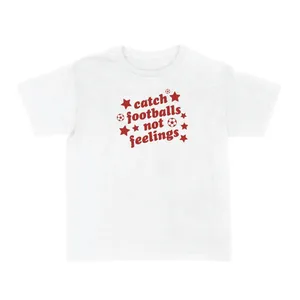 Ladies “Catch Footballs Not Feelings” Baby Tee | Women’s Funny Football Supporter Tee | White Slogan Top